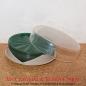 Preview: 12 DDR Vintage Untersetzer für Gläser aus Kunststoff in grau, grün und transparent inkl. Dose aus den 80er Jahren der DDR (Ø 9,5cm)