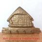 Preview: Goldfarbene Vintage Hakenleiste  Handtuchhalter in Form eines Bauernhauses bzw. Hauses mit 4 kleinen Haken aus Messing