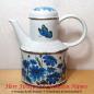 Preview: Vintage Midcentury Kaffeekanne aus Keramik in Emaille Optik weiß mit blauen Blumen und Schmetterling aus den 70er Jahren
