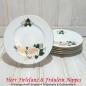 Preview: 6 kleine Vintage Teller bzw. Frühstücksteller aus weißem Porzellan goldfarbener Rose, grünen Blättern und Goldrand (VEB Freiberger Porzellan, DDR)