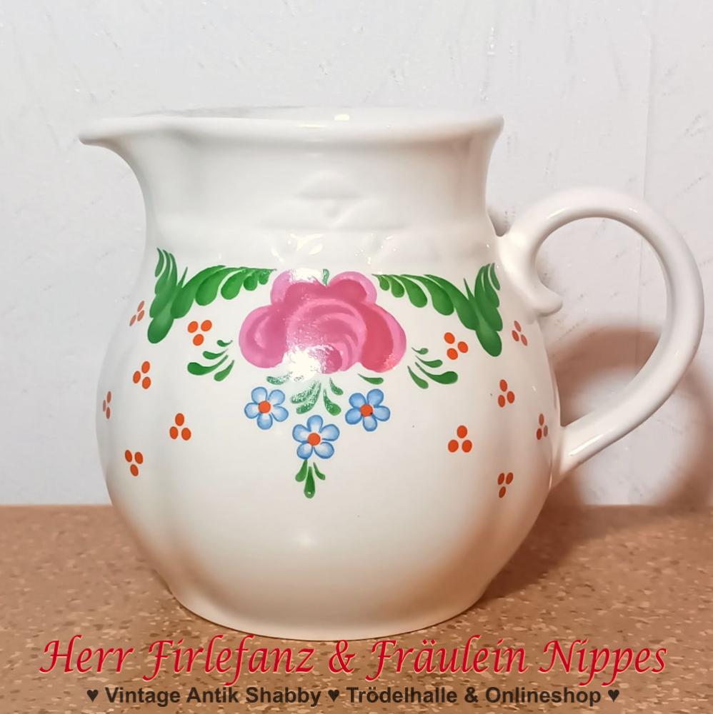 Vintage Kanne für Milch und Kakao aus Keramik in cremefarben mit buntem Blumendekor und Reliefdekor aus 70er Jahren der DDR